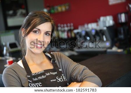 Portrait of beautiful waitress in coffee shop
