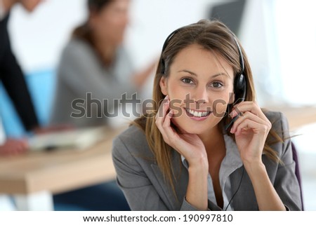 Smiling customer service representative at work