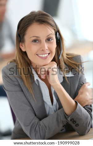 Smiling customer service representative at work