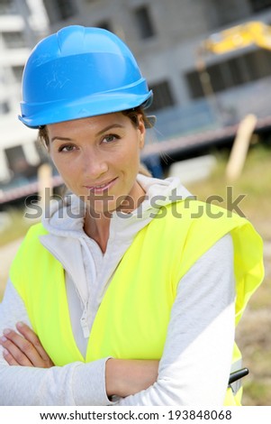 Portrait of woman engineer with security helmet