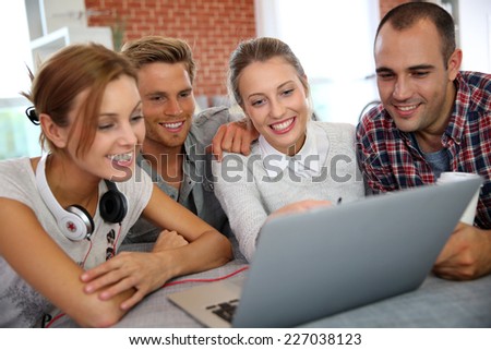 Group of friends having fun making a video call