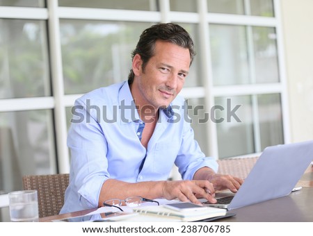 Man working from home on laptop computer