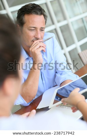 Businessman meeting client in office