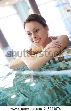 Woman relaxing in seawater spa pool