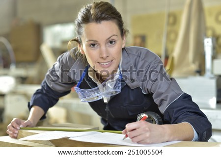 Young woman in carpentry professional training