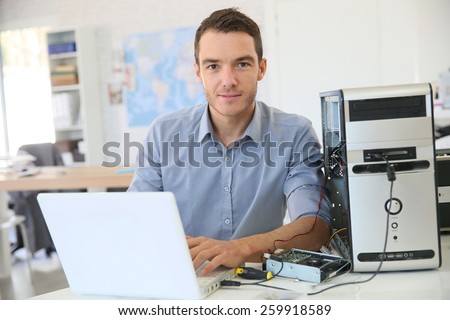 Engineer proceeding to data recovery from computer