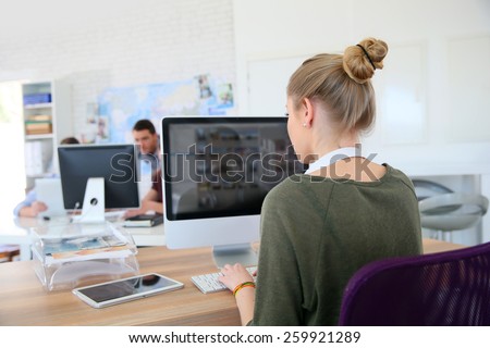 Student girl working on desktop computer