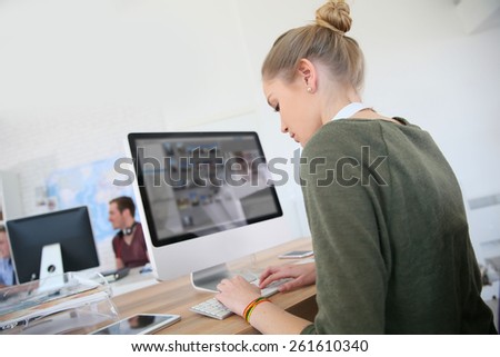 Student girl working on desktop computer