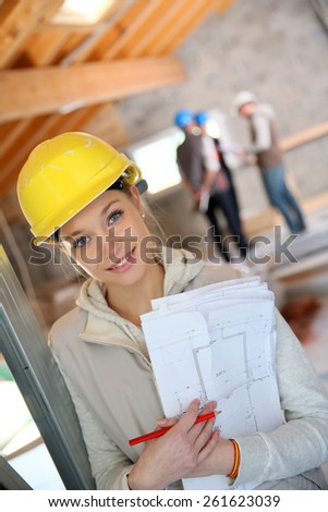 Young woman in construction professional training
