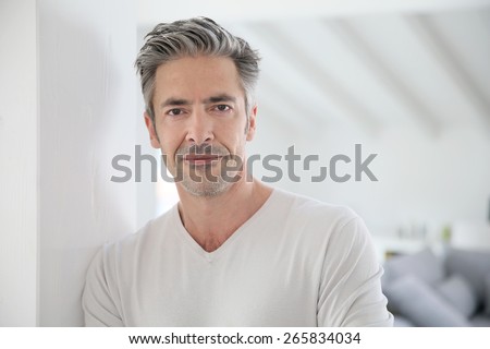 Portrait of attractive 50-year-old man