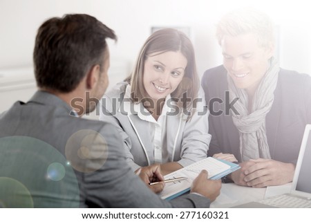 Business partners presenting business plan to investor