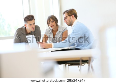 Business people working together in meeting room