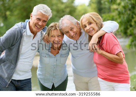 Senior couples having a good time in countryside