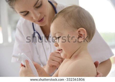 Baby in doctor\'s office for medical checkup