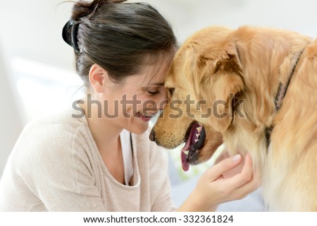 Portrait of woman with dog