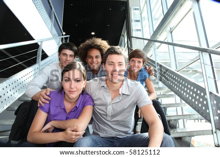 Group of happy young people at university