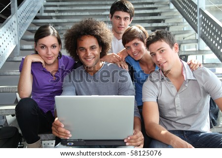 Group of college students with laptop computer