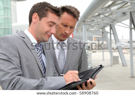 Businessmen in a business meeting away from the office