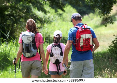 Family hiking in the countryside