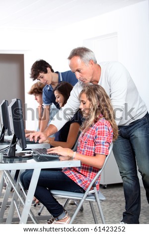 Teenagers in computing class
