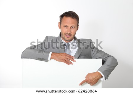 Businessman showing message board