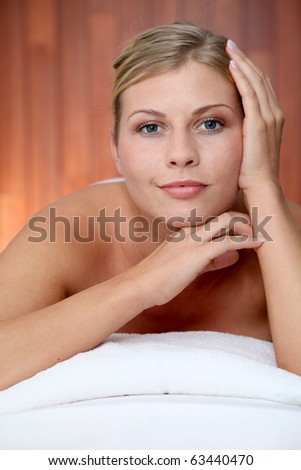 Closeup of beautiful woman on massage bed