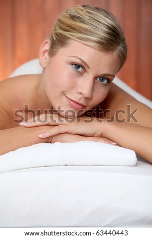 Closeup of beautiful woman on massage bed