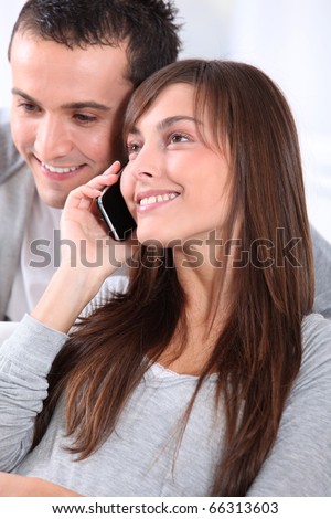 Young couple on telephone conversation