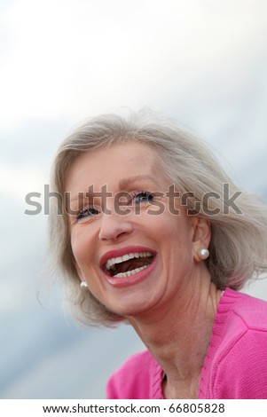 Portrait of laughing senior woman
