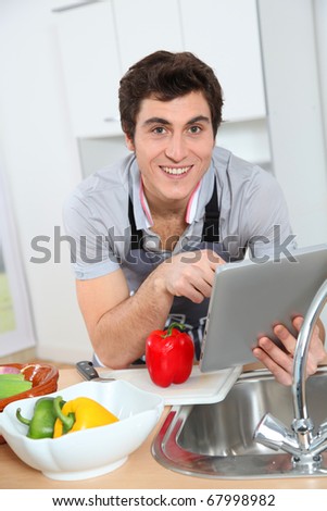 man in kitchen