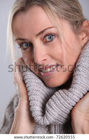 Beautiful woman wearing turtleneck sweater