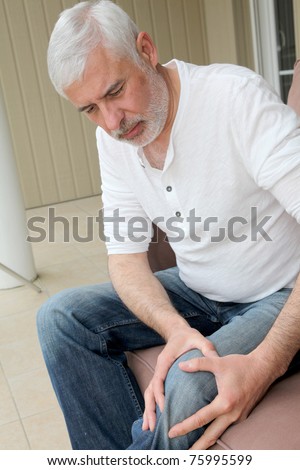 Senior man with osteoarthritis pain