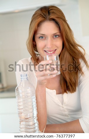 Portrait of beautiful drinking water