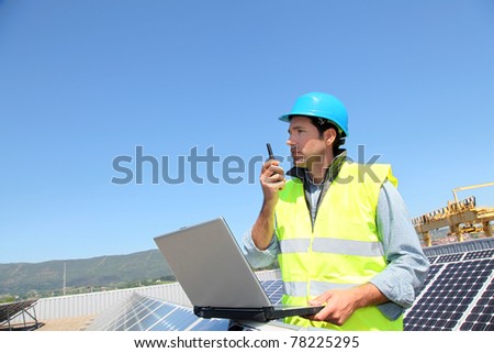 Engineer checking photovoltaic installation