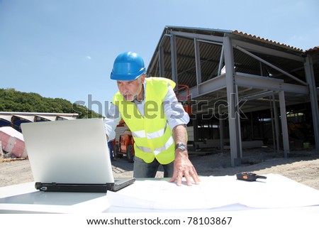 Engineer with security helmet on construction site