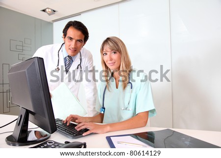 Medical people working in office