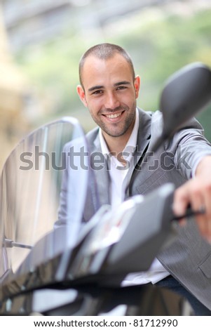 Man going to work on motorcycle