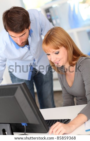 Business people working on desktop computer