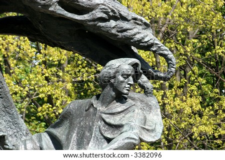 Fryderyk Chopin under Crying Willow, famous monument in Lazienki Park. Warsaw, Poland