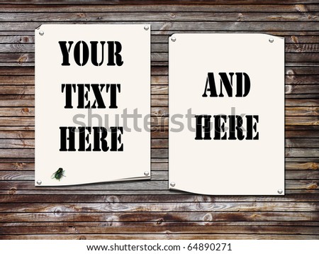 Wooden fence with two sheets of paper nailed on it for your text (western style)