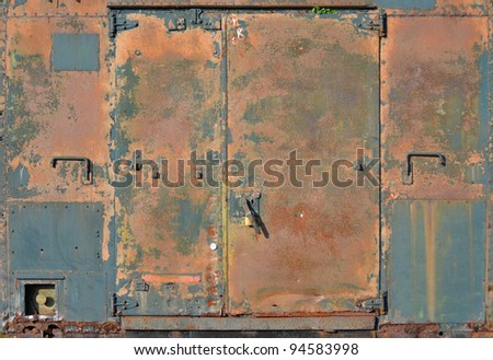Rusty doors in metal container