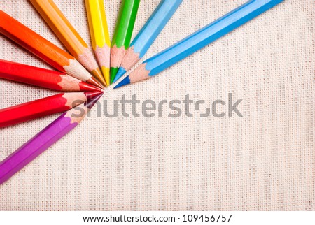 Colored pencils are a pattern on fabric