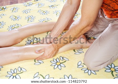 Leg massage with massage oil in the cabin