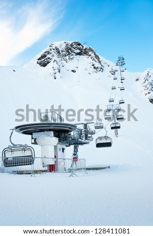 Cable car in the snowy mountains, the resort