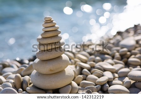 Balanced stones on the sea beach