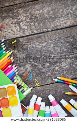 Items for children\'s creativity on a wooden background