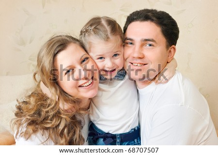 Happy family from three persons