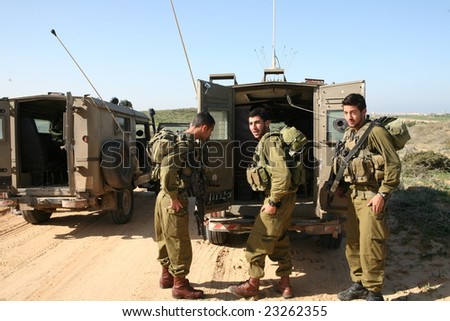 Gaza - Jan 10: israeli infantry soldiers a moment before loading into military wehicles