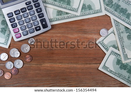 Calculator and money on the table