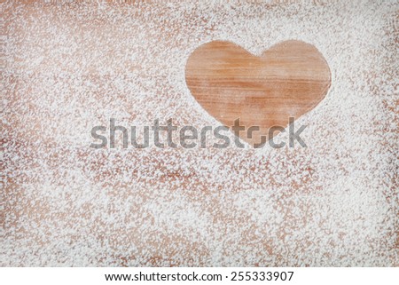 The heart of the flour on the table from the old boards
